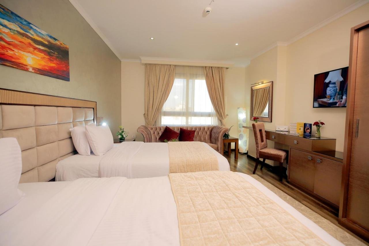 Photo of Deluxe Double Room (2 Adults + 1 Child) #14