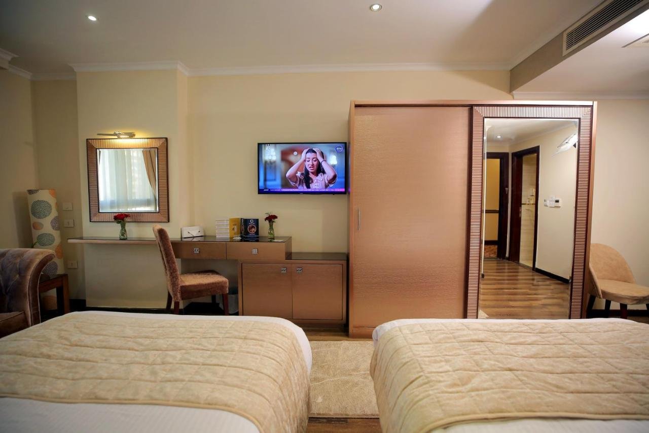 Photo of Deluxe Double Room (2 Adults + 1 Child) #13