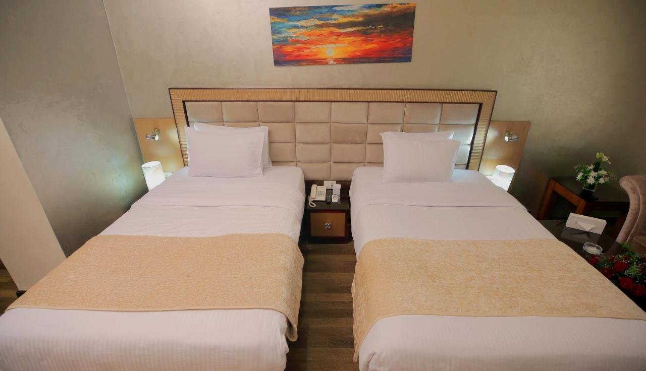 Photo of Deluxe Double Room (2 Adults + 1 Child) #8