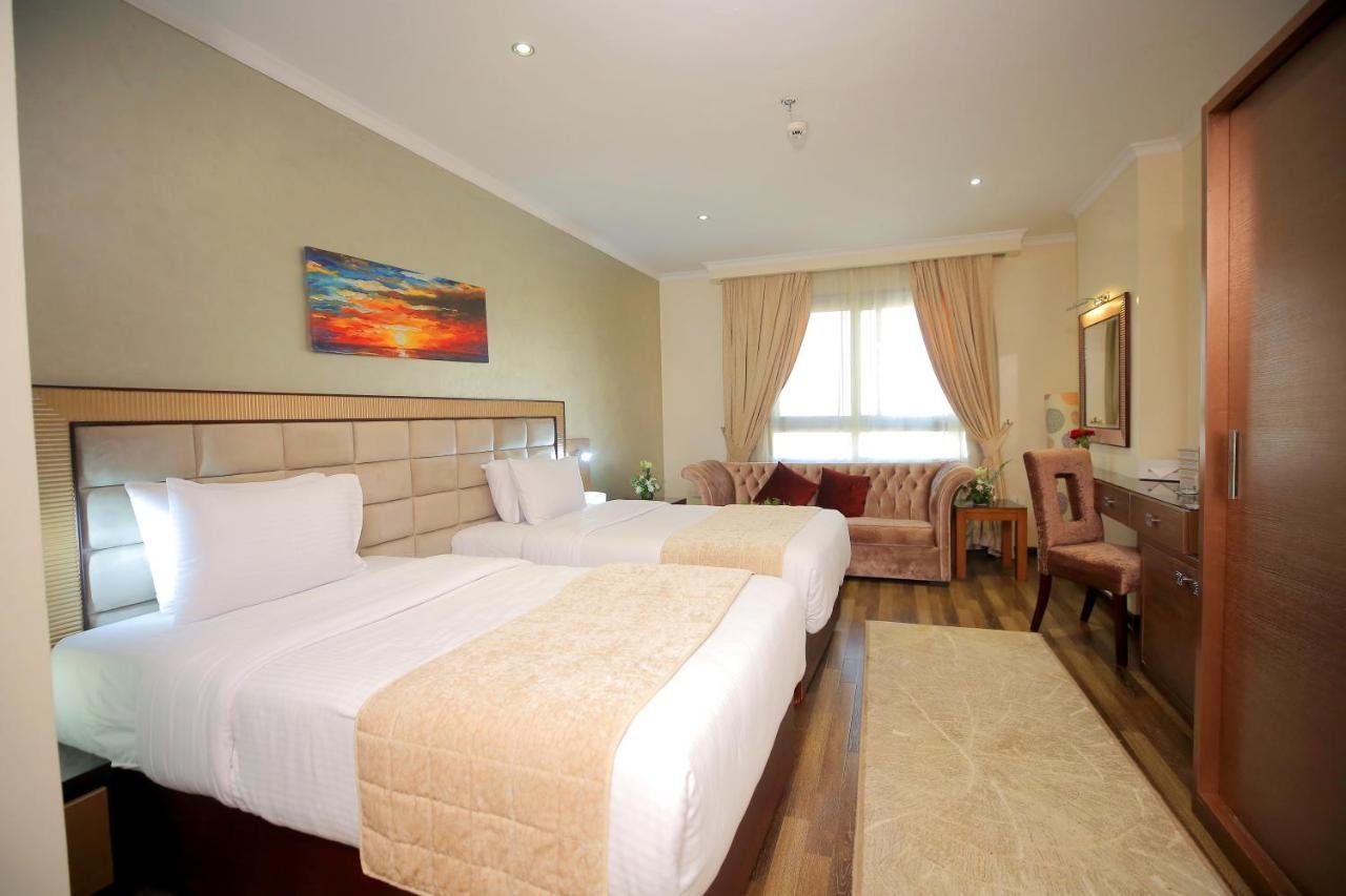 Photo of Deluxe Double Room (2 Adults + 1 Child) #10