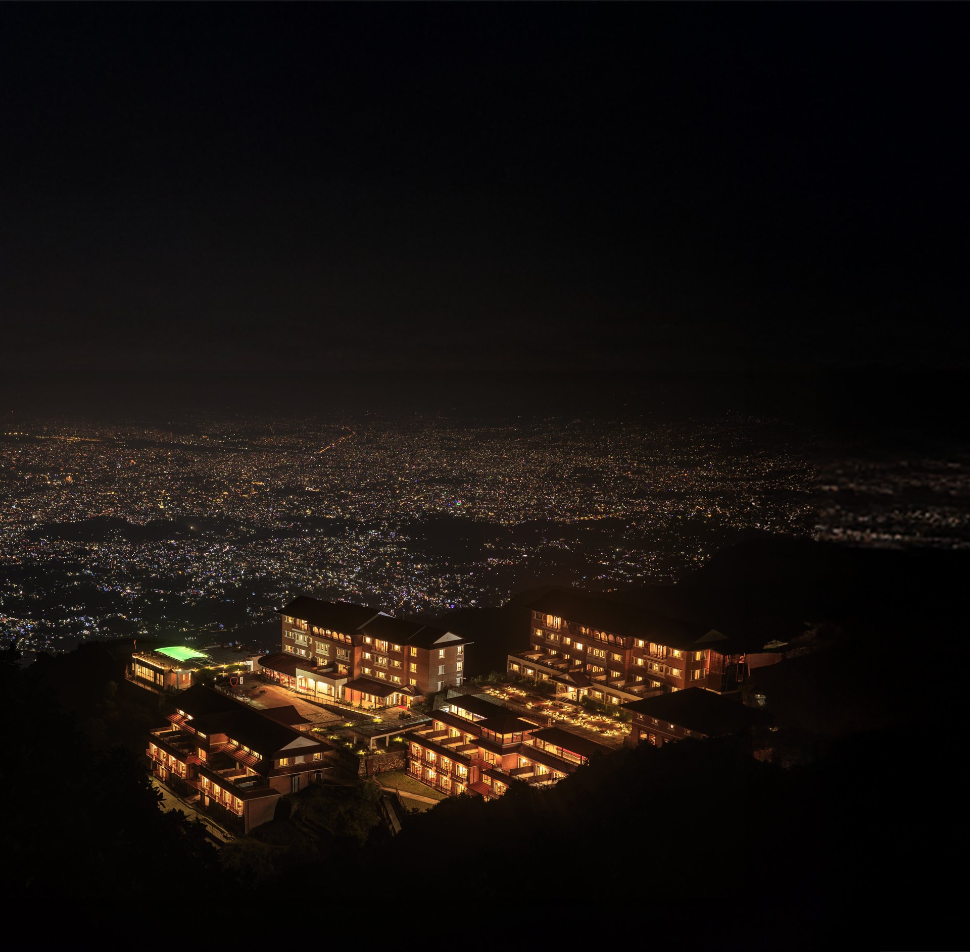 Chandragiri Hills Resort at night above the Kathmandu city lights