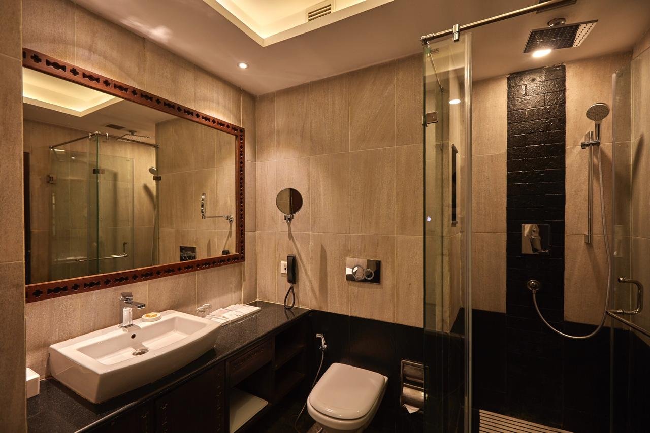 Deluxe Twin Room bathroom at Chandragiri Hills Resort