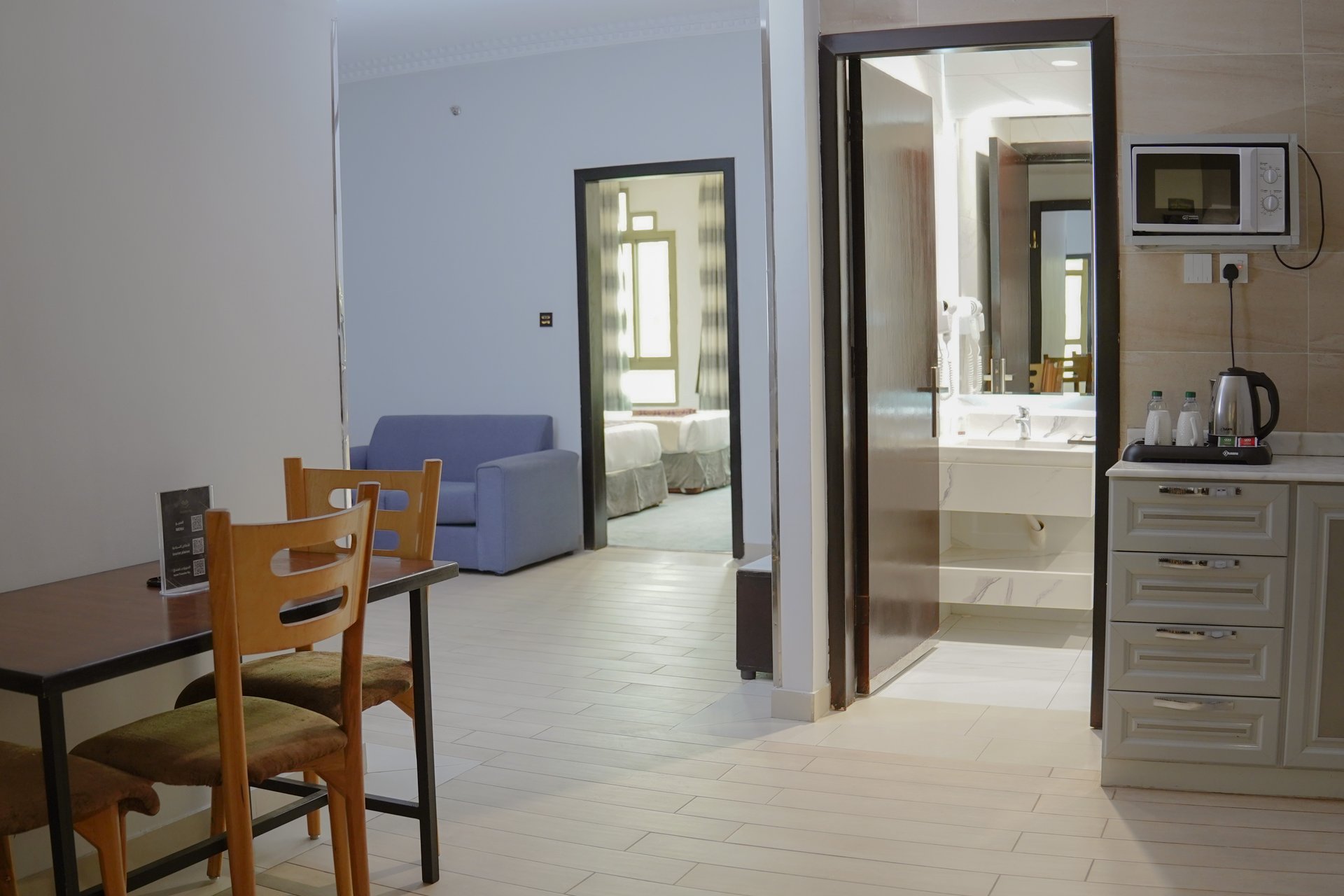 Ferbion Hotel Abha - Two-Bedroom Suite living and kitchen