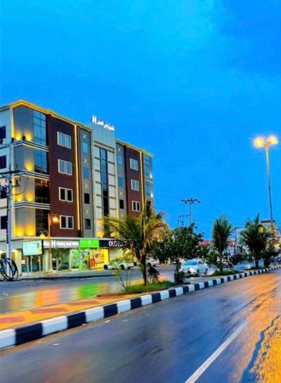 a building on the side of a city street at فندق فربيون المجاردة - Ferbion Hotel Almajardah in Al Majaridah