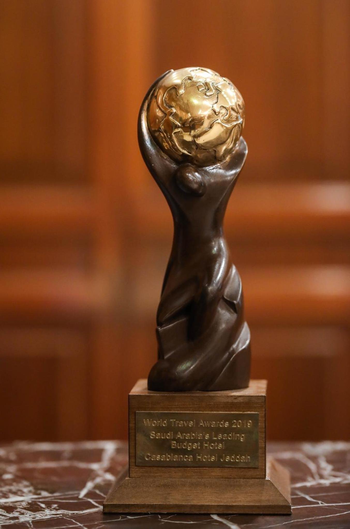 a statue of a woman with her head in the air at Casablanca Hotel Jeddah in Jeddah