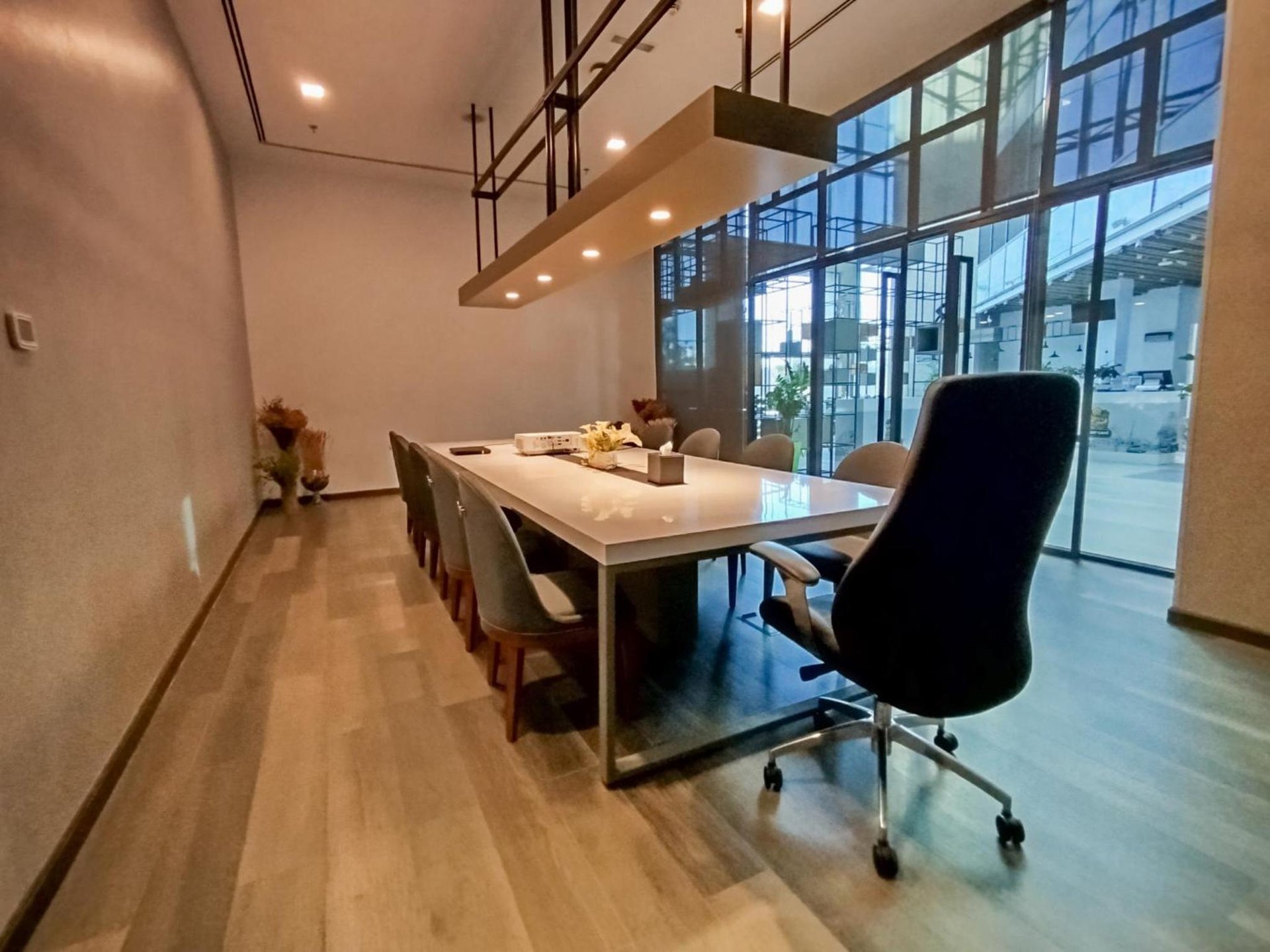 a dining room with a large table and chairs at Ibis Styles Dubai Jumeira in Dubai