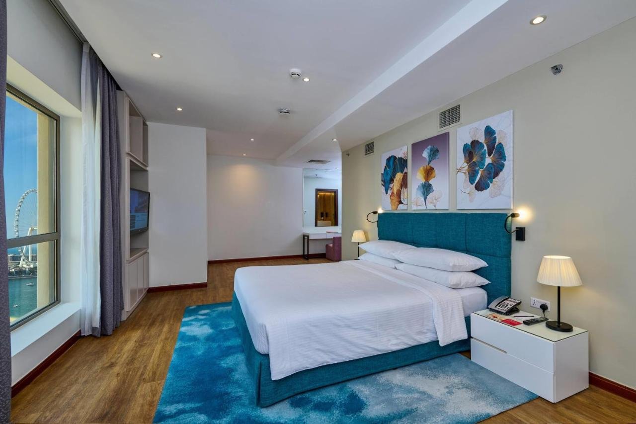 Photo of Two-Bedroom Suite with Balcony and Partial Sea View #0