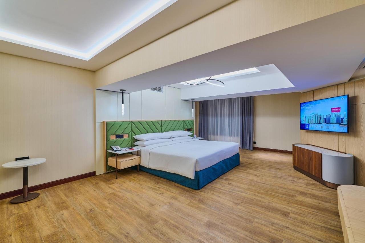 Photo of One-Bedroom Penthouse King Suite with City View #1