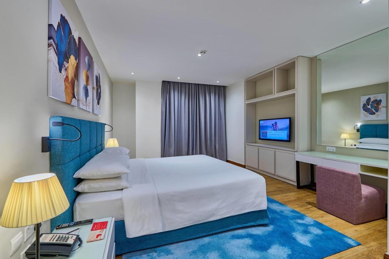Photo of One-Bedroom King Suite with Balcony and Partial Sea View #2