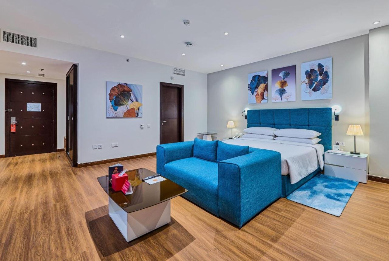 Photo of Deluxe King Room with City View #1