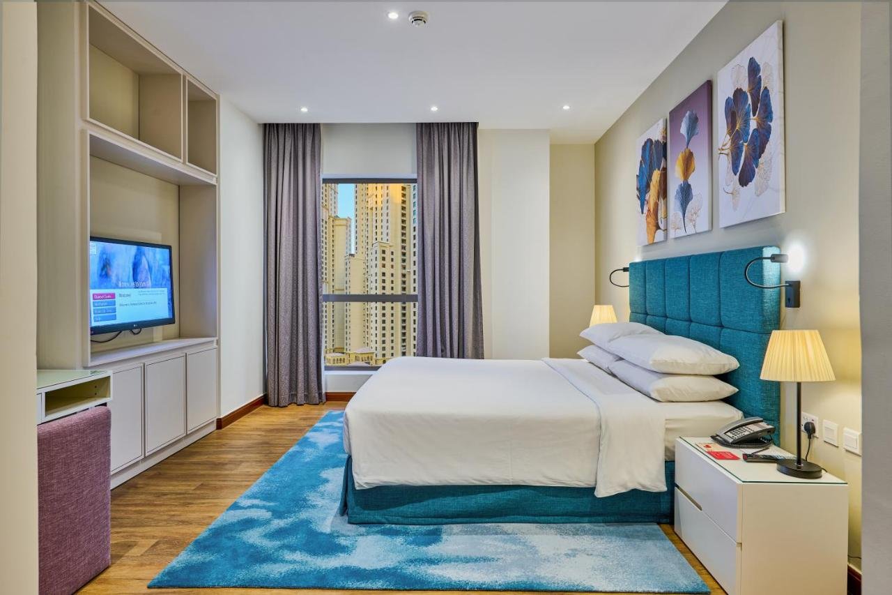 Photo of One-Bedroom King Suite with Balcony and City View #5