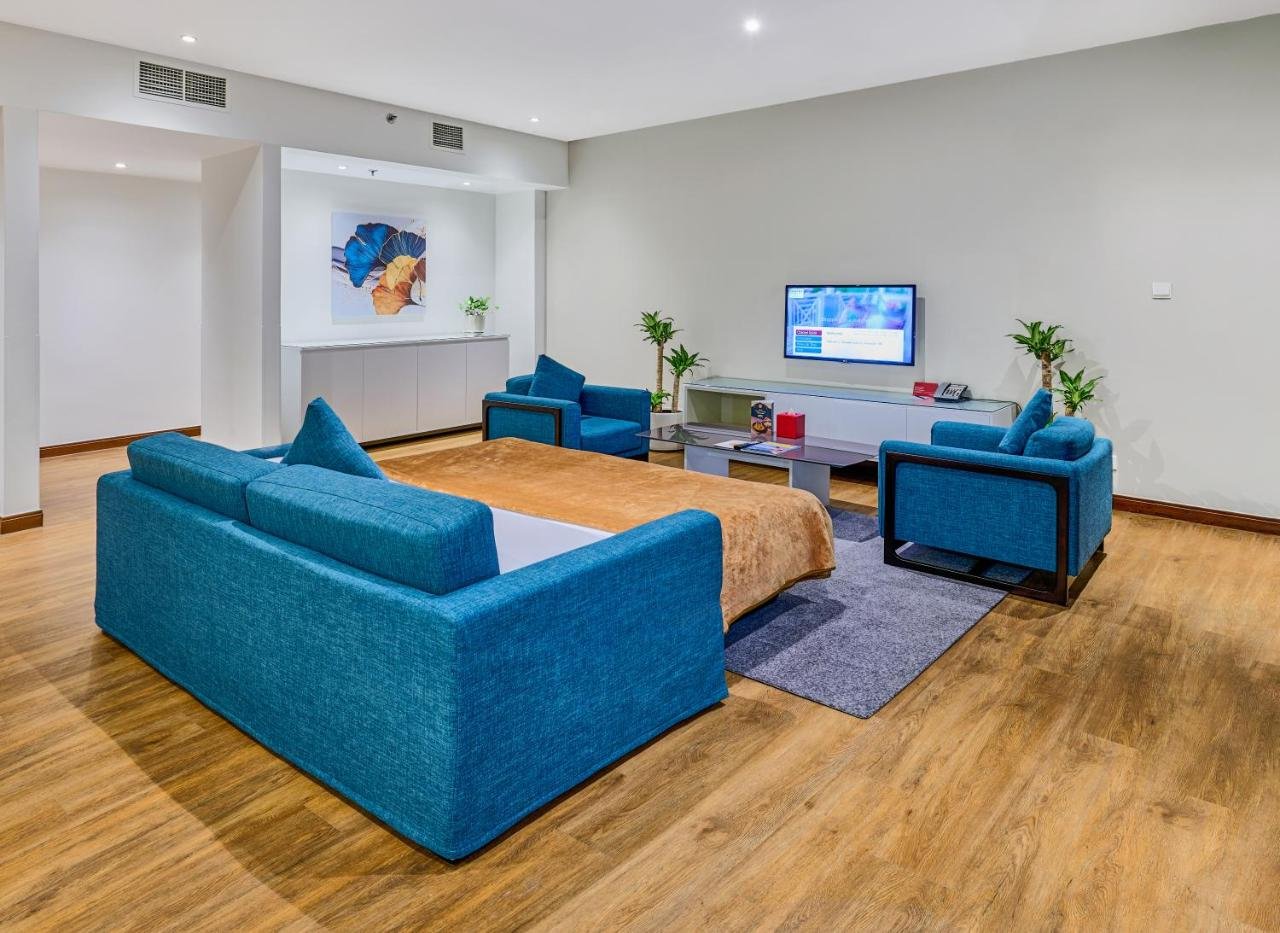 One-Bedroom King Suite with Partial Sea View