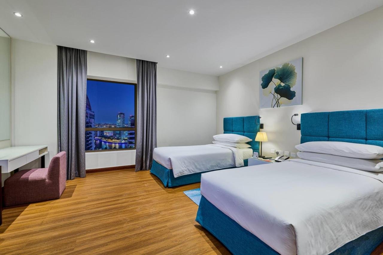Photo of Two-Bedroom Suite with Balcony and City View #2
